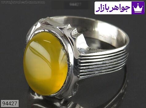 انگشتر نقره عقیق زرد با خاک تربت مردانه به همراه حرز امام جواد [شرف الشمس] - 94427